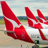 Fair Work orders Qantas to reinstate flight attendants who were sacked for allegedly misusing Cabcharge cards