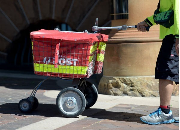 Australia Post to cut 2000 jobs as it pushes for move to slower mail service