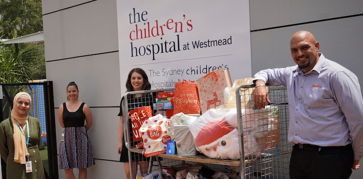 Christmas spirit: Why this manager drove around Sydney to collect 300 toys for a children's hospital