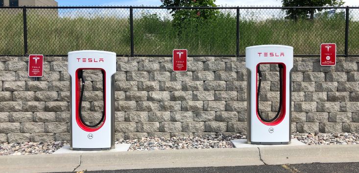 Tesla finally allows other EVs to use its Superchargers… at a premium