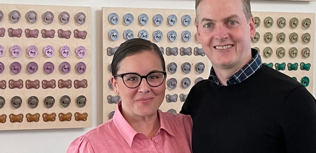 Mr Indeva founders Melinda Farley and Robert Farley photographed in front of baby dummies